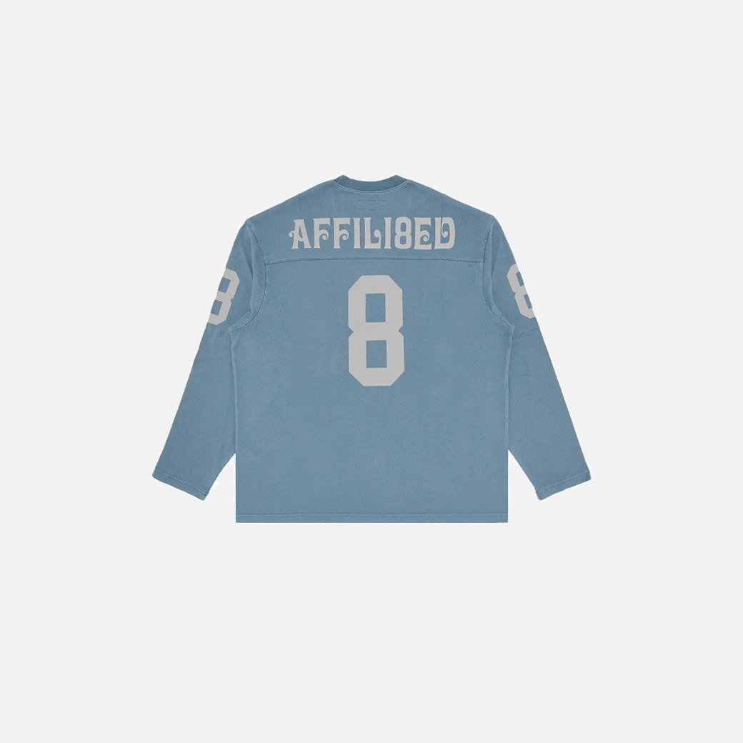 Blue long-sleeve shirt with 'AFFILIATED' text and number '8' on a white background