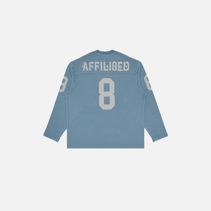 Blue long-sleeve shirt with 'AFFILIATED' text and number '8' on a white background