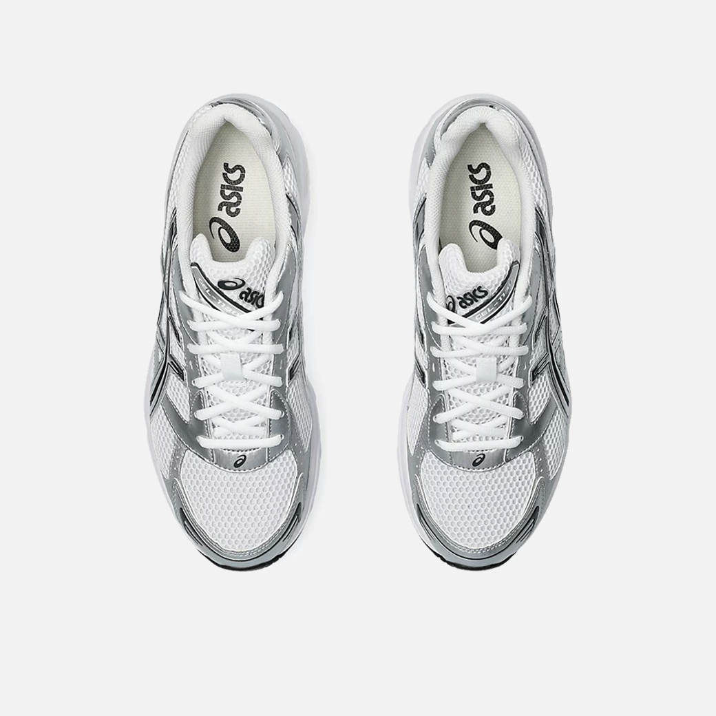 A pair of ASICS Gel-1130 white and silver running shoes with mesh overlays and GEL technology for shock absorption, top view.