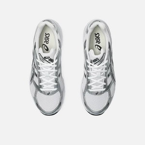 A pair of ASICS Gel-1130 white and silver running shoes with mesh overlays and GEL technology for shock absorption, top view.