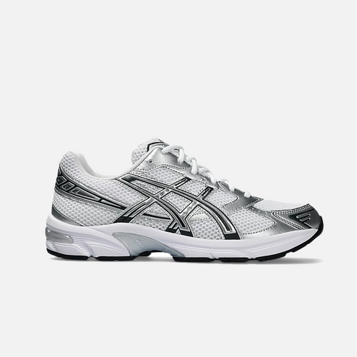 A pair of ASICS Gel-1130 white and silver running shoes with mesh overlays and GEL technology for shock absorption.
