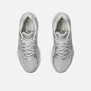 A pair of ASICS Gel-Kayano 14 Cloud Grey running shoes for women, featuring a mesh upper with grey accents and a midsole with GEL technology for cushioning, Top view.