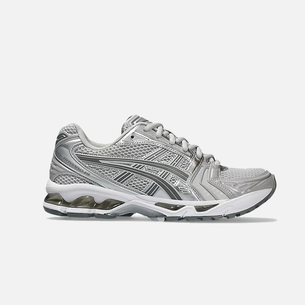 A pair of ASICS Gel-Kayano 14 Cloud Grey running shoes for women, featuring a mesh upper with grey accents and a midsole with GEL technology for cushioning.