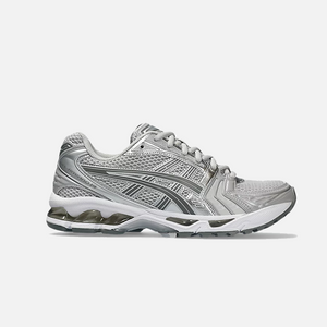 A pair of ASICS Gel-Kayano 14 Cloud Grey running shoes for women, featuring a mesh upper with grey accents and a midsole with GEL technology for cushioning.