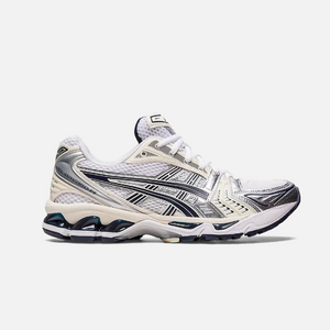A pair of ASICS Gel-Kayano 14 white and midnight color sneakers for women.