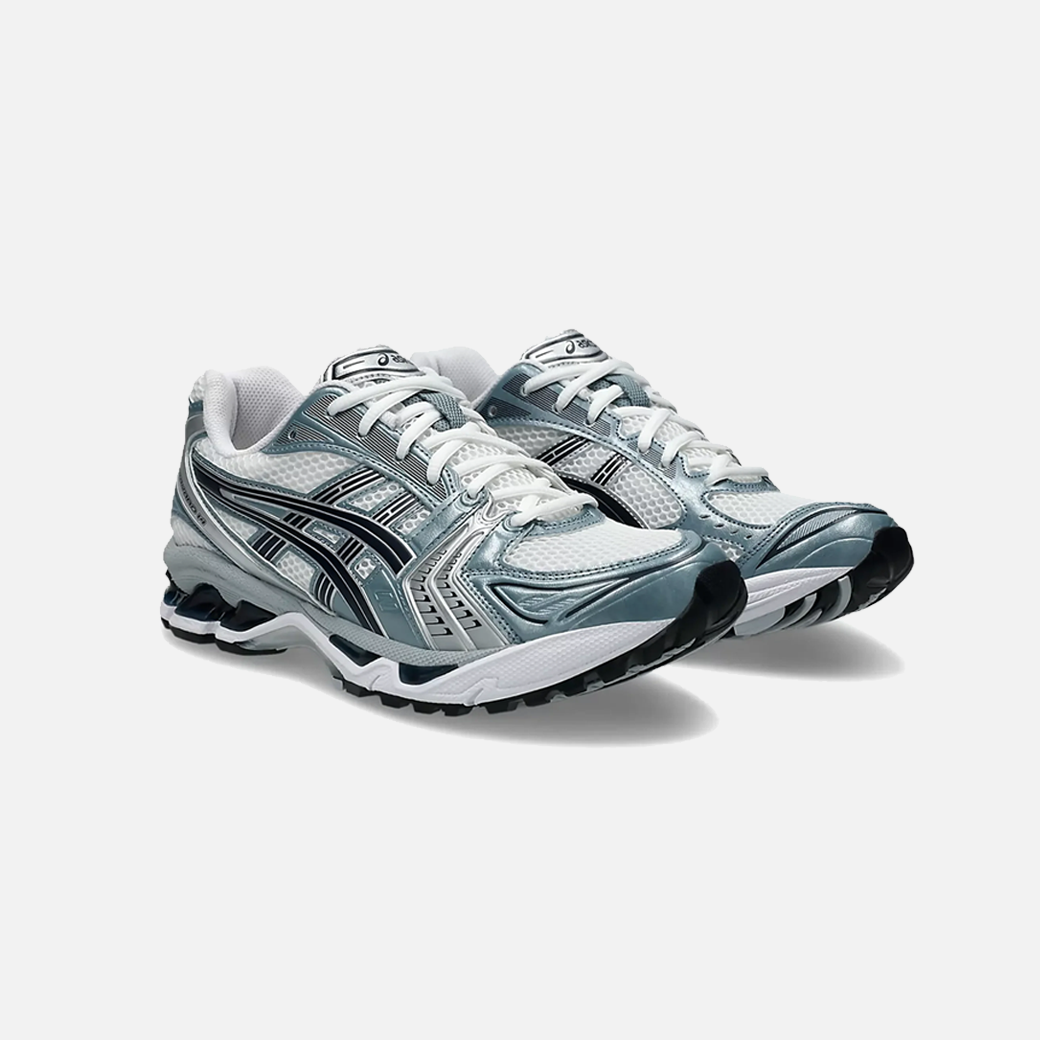 ASICS Gel-Kayano 14 Fjord Grey sneaker with a combination of grey, blue, and white colors, showcasing the side profile of the sneaker with mesh material and cushioning technology. Side View.