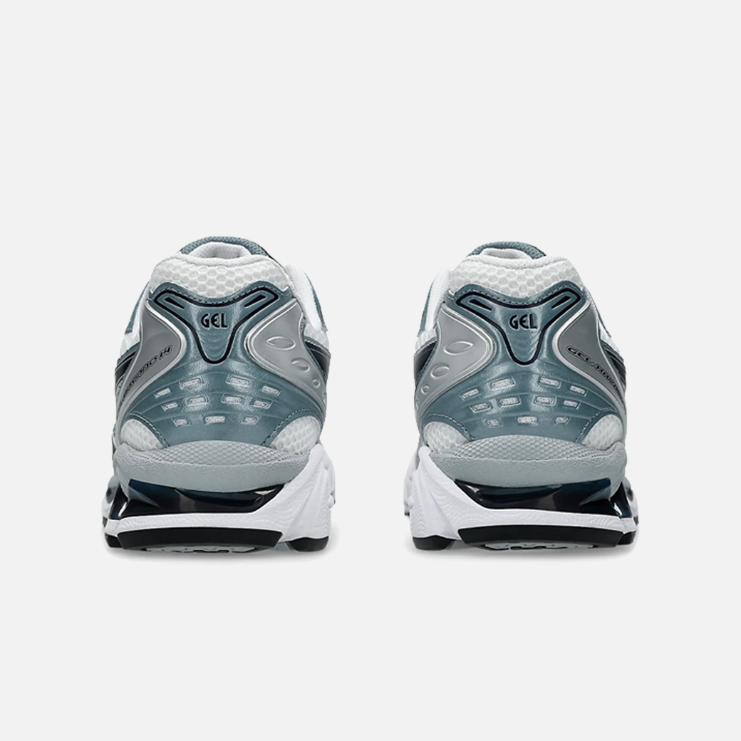 ASICS Gel-Kayano 14 Fjord Grey sneaker with a combination of grey, blue, and white colors, showcasing the side profile of the sneaker with mesh material and cushioning technology. Back View.