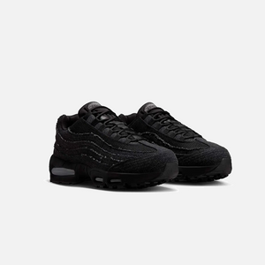Levi’s x Nike Air Max 95 OG Black Anthracite side view, limited edition sneaker collaboration, detailed profile of black and anthracite Air Max 95, premium streetwear trainers.