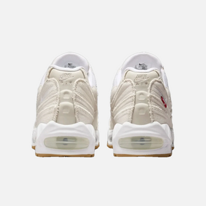 Levi’s x Nike Air Max 95 OG Light Orewood Brown back view, heel logo detailing, neutral denim and suede design, limited edition Nike collaboration, lifestyle sneakers.