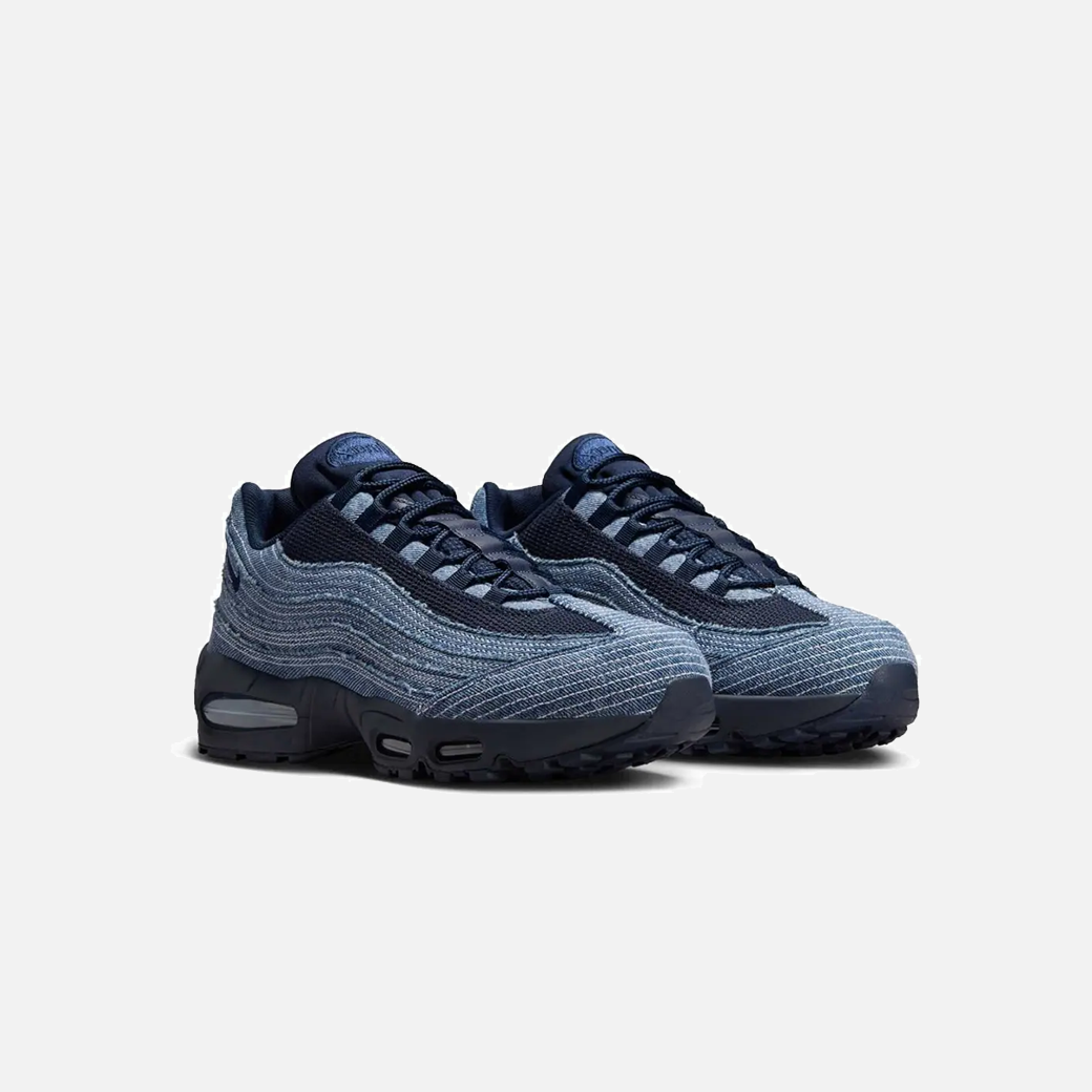 Levi’s x Nike Air Max 95 OG Obsidian side view, denim and suede upper, dark blue tones, limited edition Nike Air Max collab, premium streetwear sneakers.