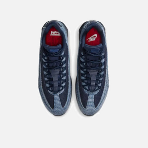 Levi’s x Nike Air Max 95 OG Obsidian top view, denim upper with layered design, dark blue tones, limited edition Nike collaboration, premium lifestyle sneakers.