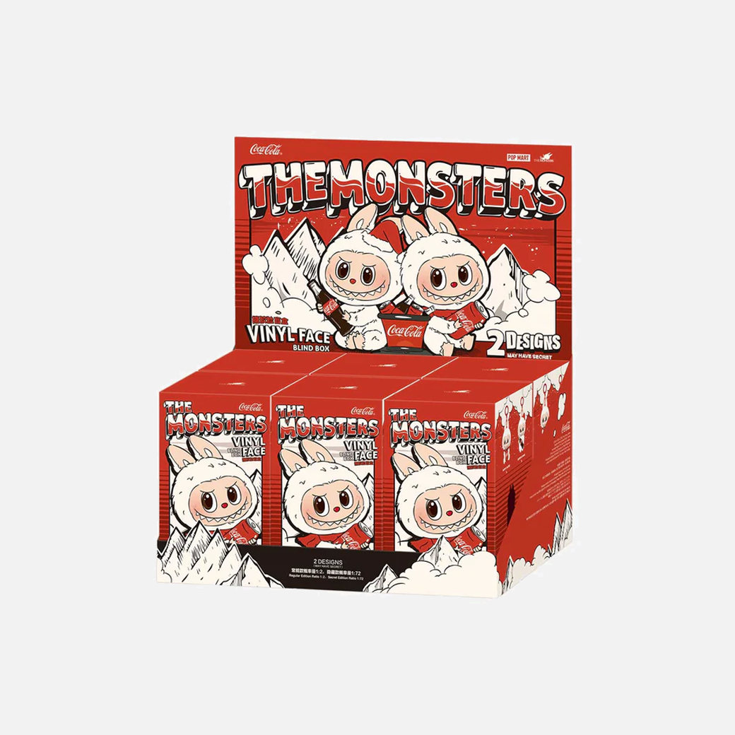 Box of 'The Monsters' Labubu vinyl figures with Coca-Cola branding on a white background